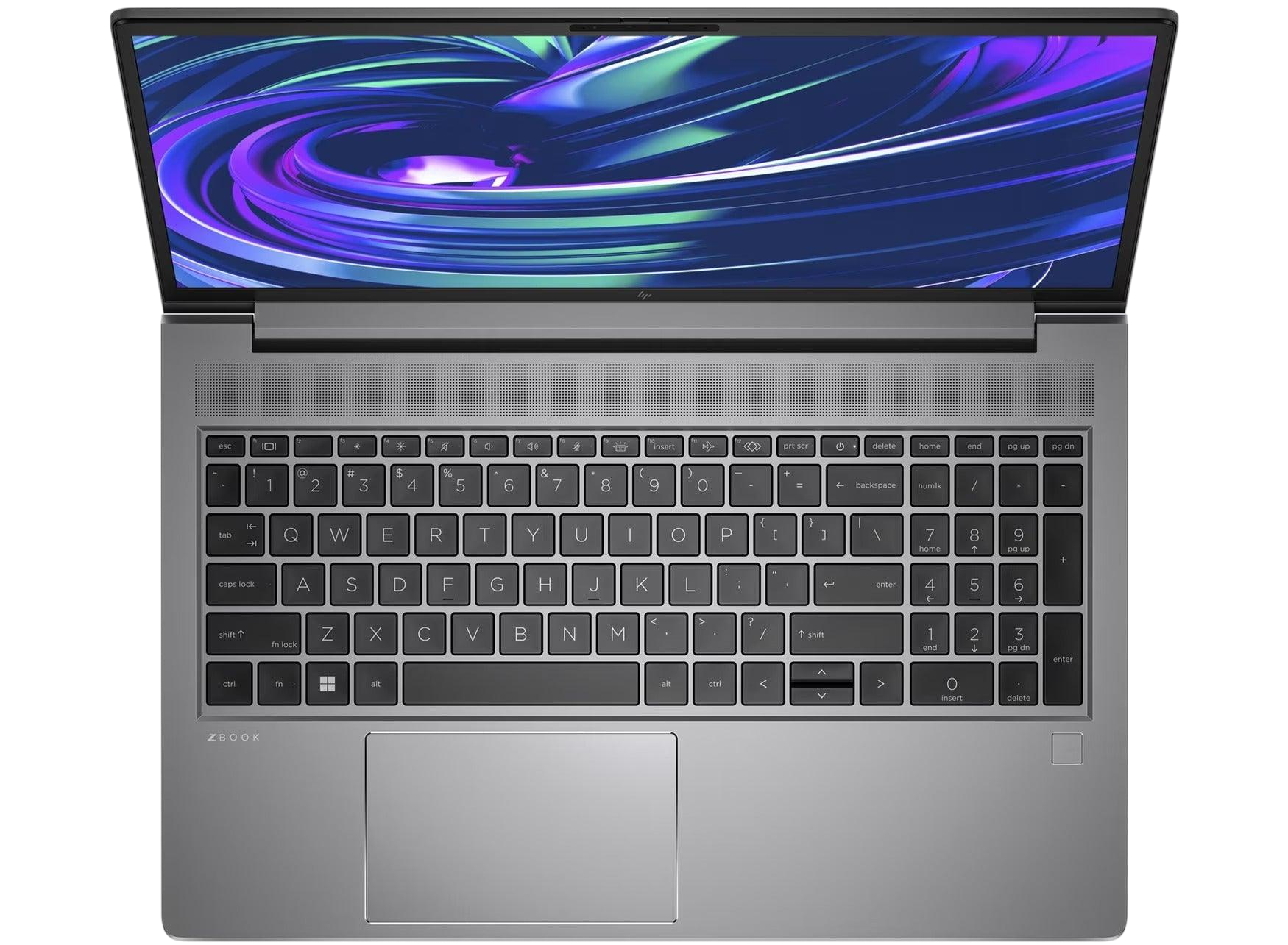 an open laptop with a silver keyboard and a large, colorful display screen.