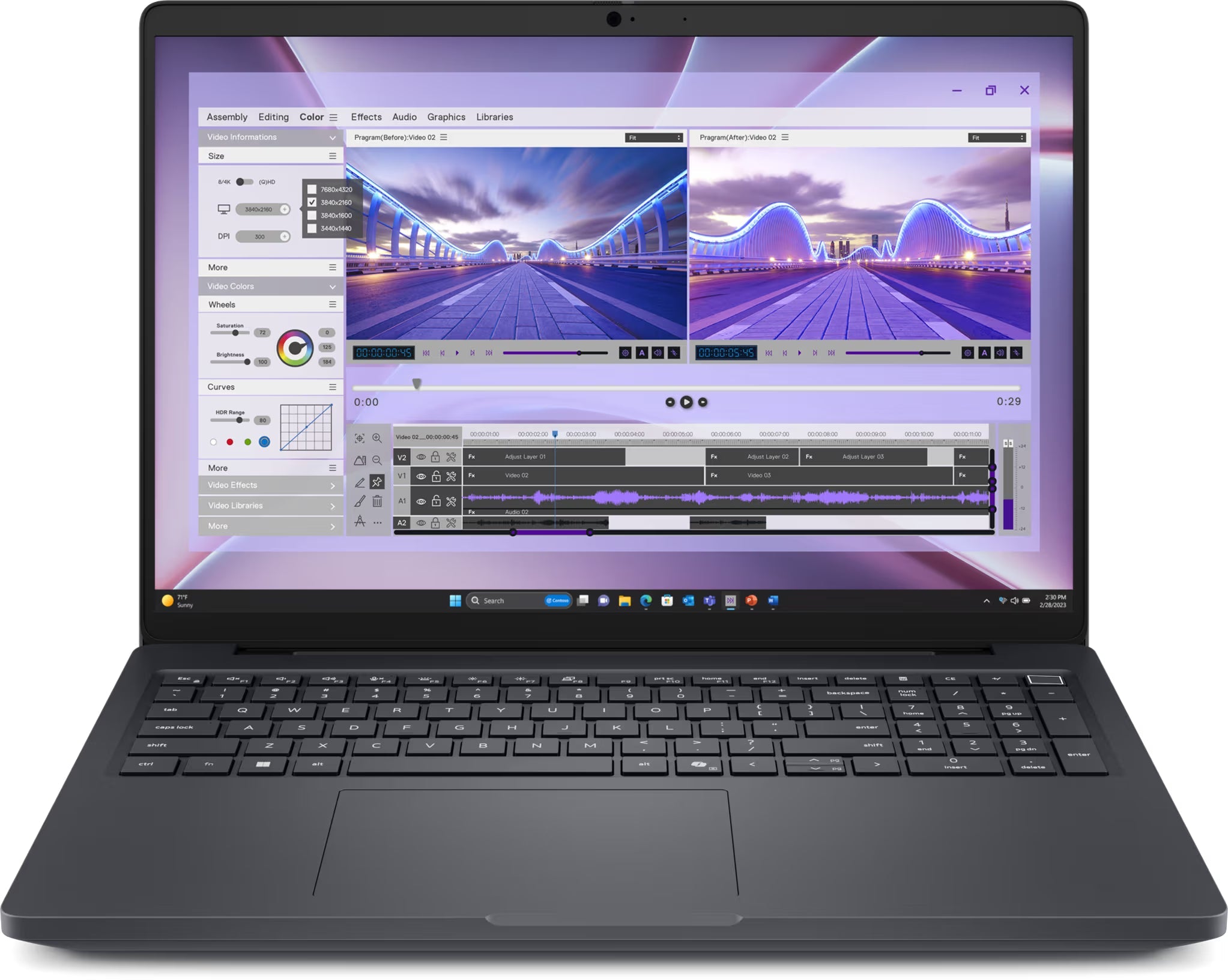 a laptop with a video editing software interface open on its screen. The software interface shows various editing tools and options, including a timeline, timeline effects, and a video player. The laptop is placed on a white surface, and the image does not contain any text.