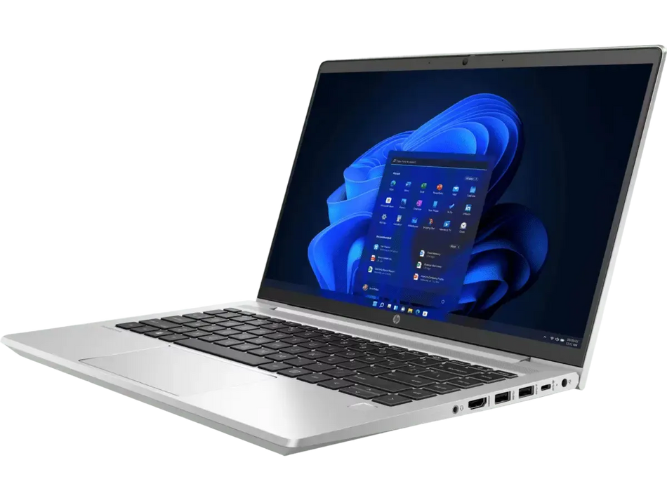 a silver laptop with a blue and white Windows operating system displayed on its screen.