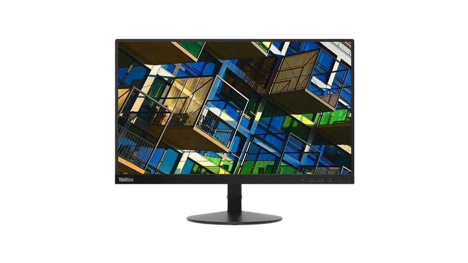 a computer monitor displaying a colorful, abstract image of a building with various geometric shapes and patterns.
