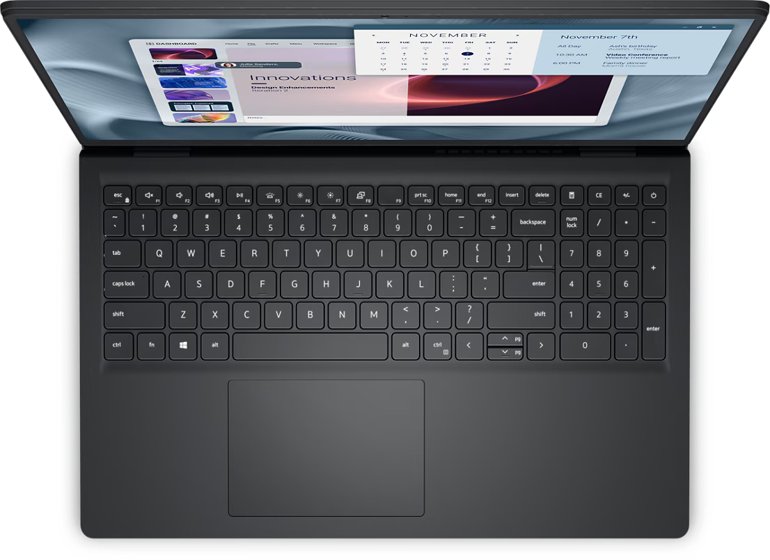 an open laptop with a black keyboard and touchpad. The laptop screen displays a calendar and a webpage, indicating that it is in use.