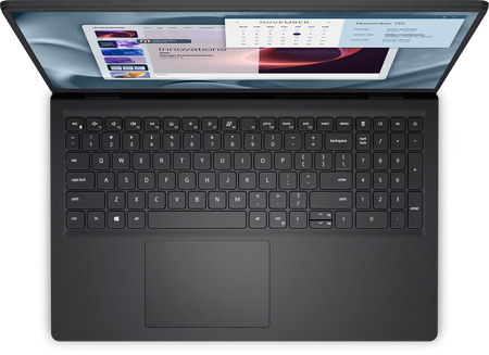 an open laptop with a black keyboard and touchpad. The laptop screen displays a calendar and a webpage, indicating that it is in use.