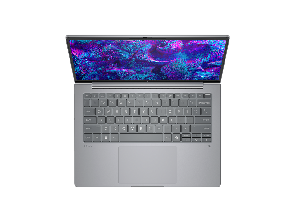 a silver laptop with a vibrant, colorful wallpaper displayed on its screen.