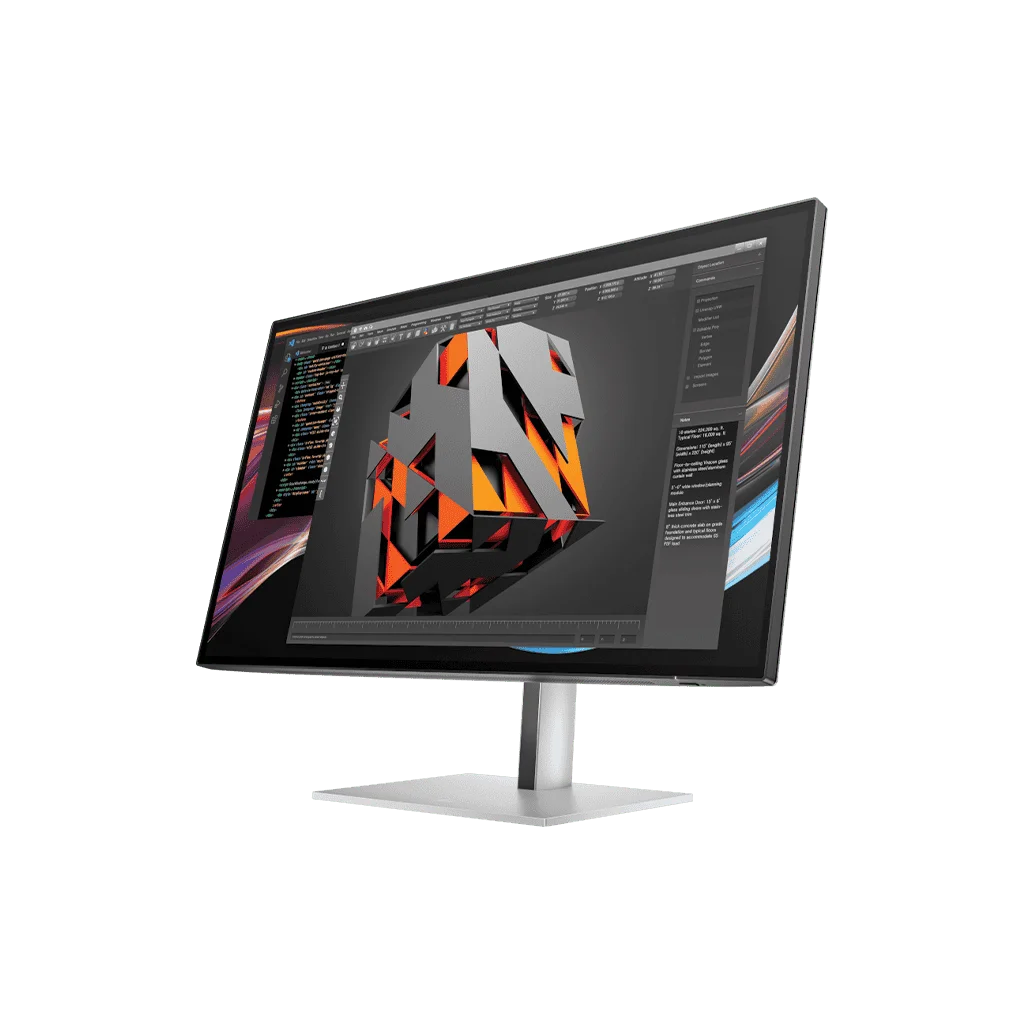 a computer monitor displaying a 3D cube graphic on its screen.