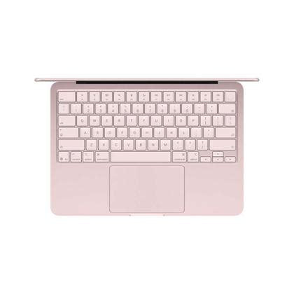 MacBook Neo Blush aberto, visto de cima, com teclado e trackpad.