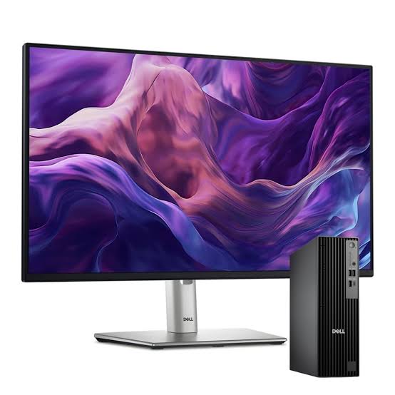 a large monitor displaying a vibrant, swirling purple and pink abstract background, and a smaller black Dell computer tower next to it.