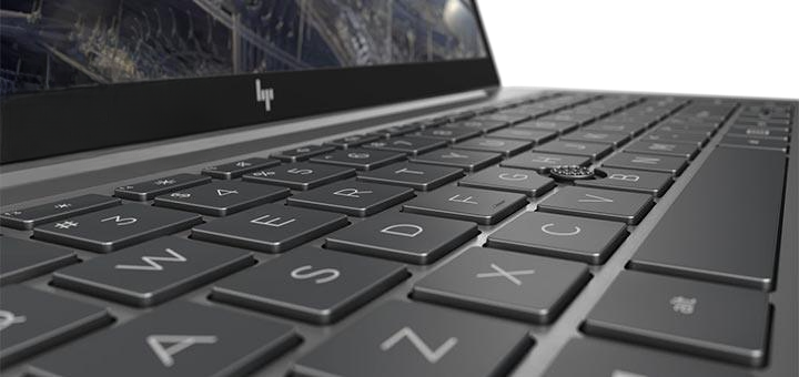 a close up of a laptop computer keyboard