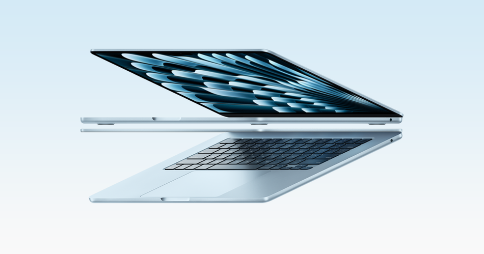 a silver laptop with a black keyboard and a large screen displaying a blue abstract pattern.