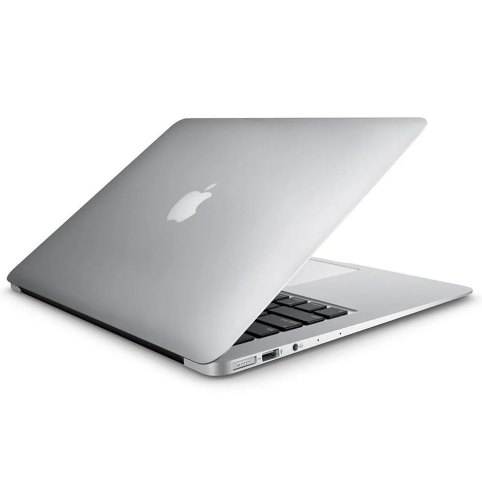 A silver MacBook laptop with its lid open, revealing the keyboard and trackpad.