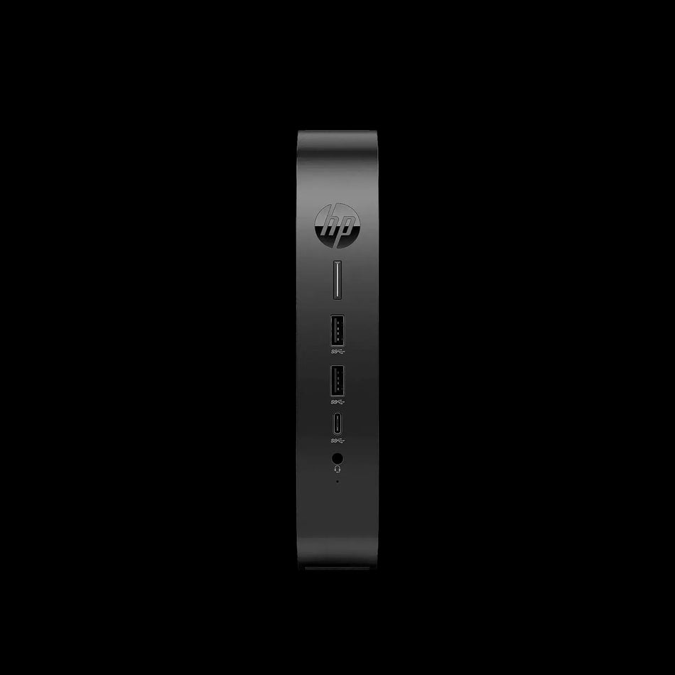 a black electronic device, possibly a computer or a charging station, with a few ports and buttons on the front.