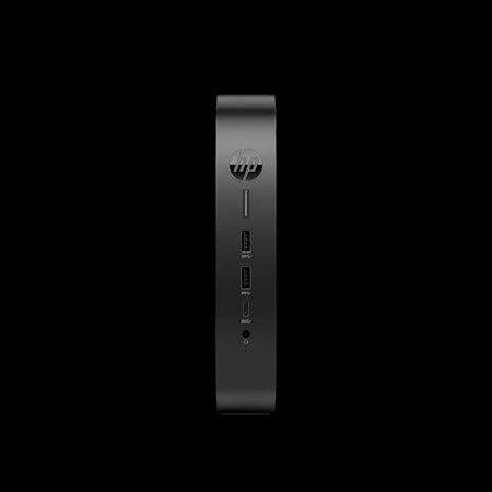 a black electronic device, possibly a computer or a charging station, with a few ports and buttons on the front.