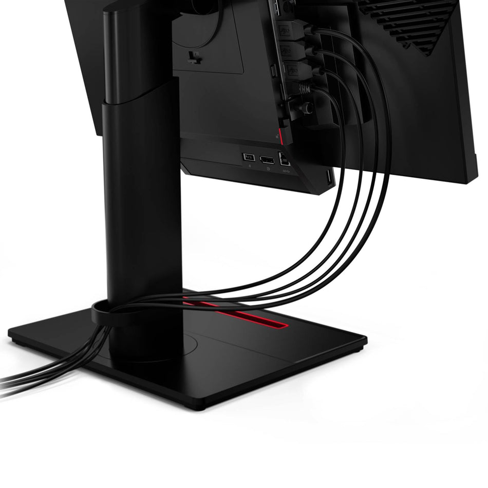 a computer monitor with multiple cables connected to it, indicating a multi-plug setup.