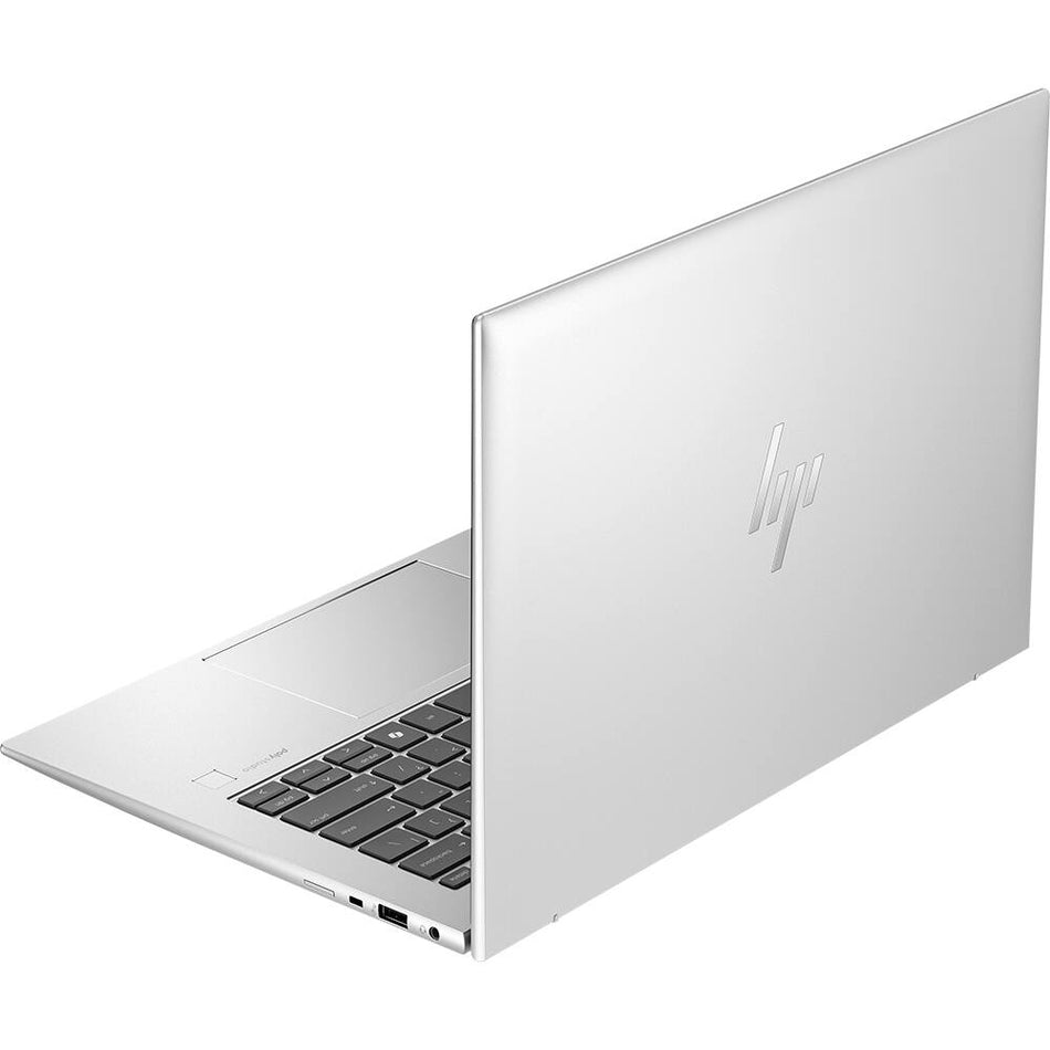 a silver-colored laptop with a black keyboard and trackpad.