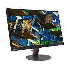 Monitor Montor Lenovo ThinkVison preto, com tela plana e moldura fina, exibindo uma imagem arquitetônica colorida.